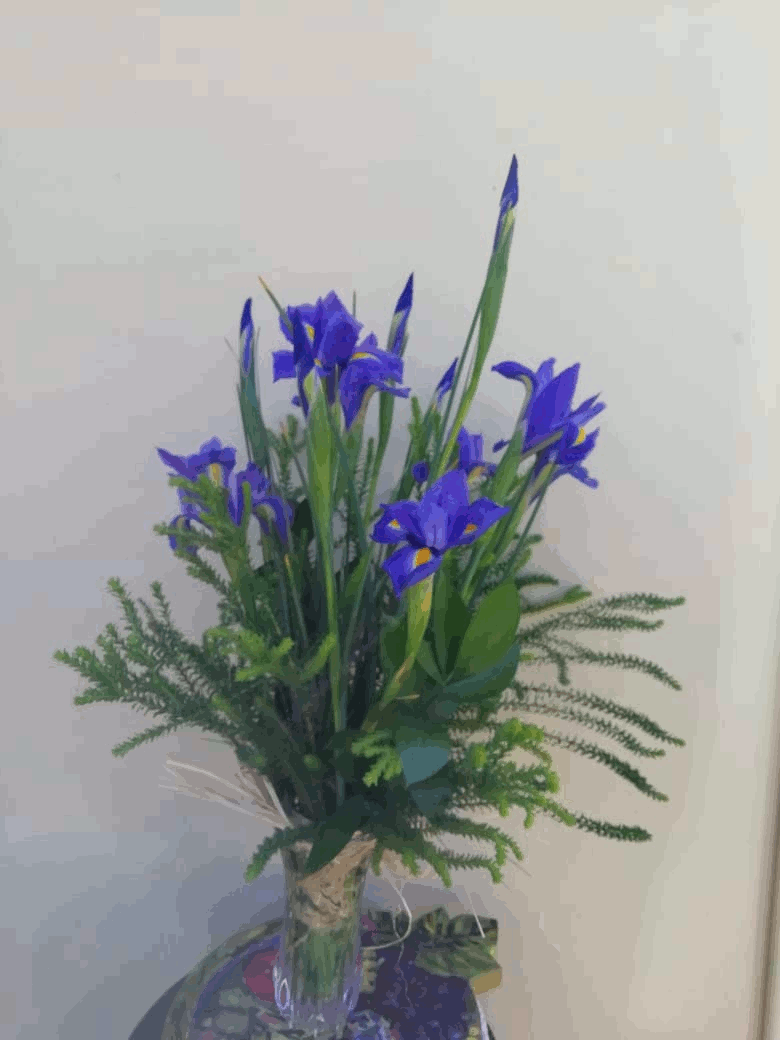 Glass vase with irises and greener from R580 Glass vase with irises and greener from R580